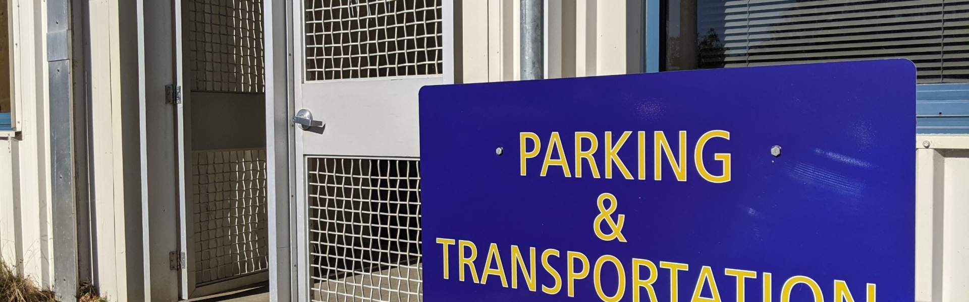 Parking & Transportation Entrance Sign